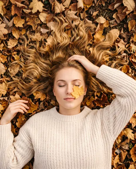 Lying in a Bed of Fall Leaves